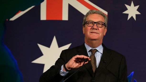 File- This June 22, 2015, file photo shows Australian High Commissioner Alexander Downer, left, speaking to guests during a welcome party at the Australian High Commission in London. Trump campaign adviser George Papadopoulos told the diplomat, Downer, during a meeting in London in May 2016 that Russia had thousands of emails that would embarrass Democratic candidate Hillary Clinton, the report said. Downer, a former foreign minister, is Australiaâ€™s top diplomat in Britain. Australia passed the information on to the FBI after the Democratic emails were leaked, according to The Times, which cited four current and former U.S. and foreign officials with direct knowledge of the Australiansâ€™ role. (AP Photo/Alastair Grant, File)