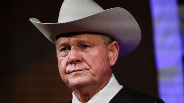 FILE - In this Monday, Sept. 25, 2017, file photo, former Alabama Chief Justice and U.S. Senate candidate Roy Moore speaks at a rally, in Fairhope, Ala. In the face of sexual misconduct allegations, Moore's U.S. Senate campaign has been punctuated by tense moments and long stretches without public appearances. Moore faces Democrat Doug Jones for Alabama's U.S. Senate seat in the Dec. 12 election. (AP Photo/Brynn Anderson, File)