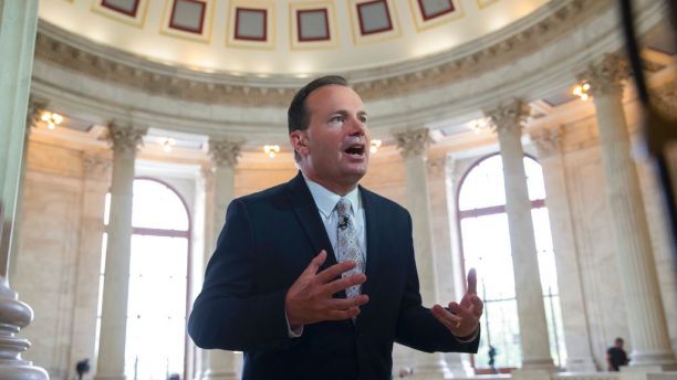 In this July 11, 2017, photo, Sen. Mike Lee, R-Utah responds to questions about his opposition to the GOP health care bill, during a TV news interview on Capitol Hill in Washington. A health care proposal from Senate conservatives would let insurers sell skimpy policies provided they also offer a comprehensive alternative. Itâ€™s being billed as pro-consumer, allowing freedom of choice and potential savings for many. (AP Photo/J. Scott Applewhite)