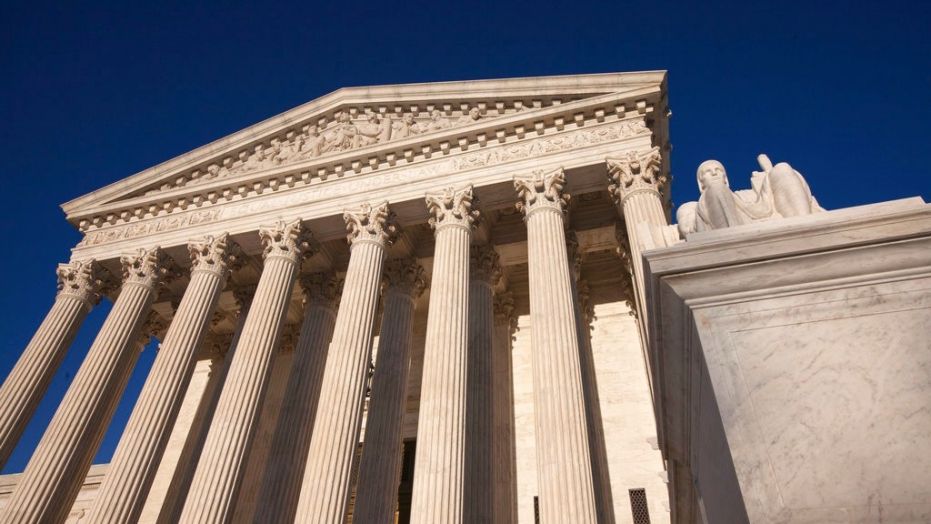 The national debate on abortion continued Monday, as a federal judge considered a pregnant immigrant teenager's request to have an abortion. Pictured: the Supreme Court building in Washington, D.C.