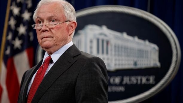 U.S. Attorney General Jeff Sessions stands during a news conference to discuss "efforts to reduce violent crime" at the Department of Justice in Washington, U.S., December 15, 2017. REUTERS/Joshua Roberts - RC11447E3F70