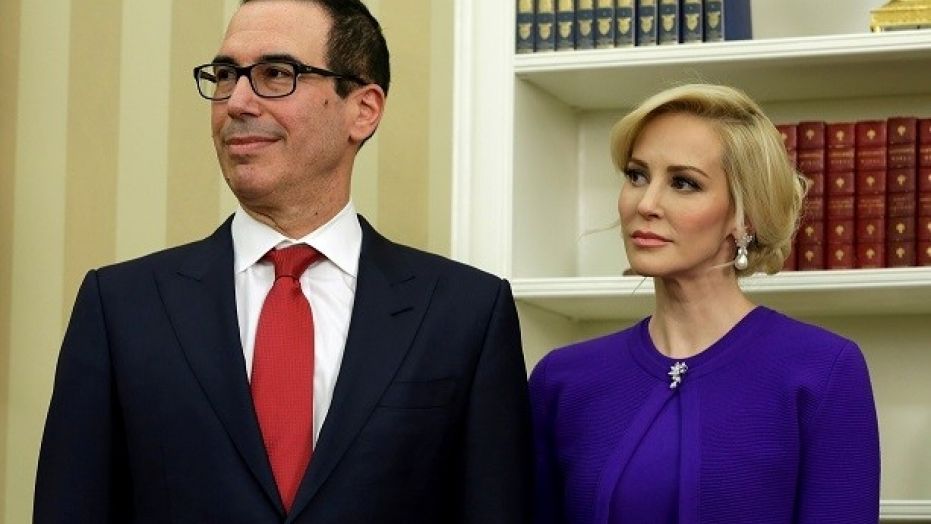Steve Mnuchin and his then-fiancee Louise Linton are seen in the White House before his swearing in as U.S. treasury secretary, Feb. 13, 2017.