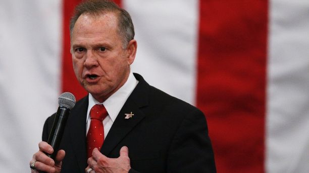 FILE- In this Dec. 11, 2017, file photo, U.S. Senate candidate Roy Moore speaks at a campaign rally in Midland City, Ala.  Moore is telling supporters â€œthe battle is not overâ€ in Alabamaâ€™s Senate race as he asks for campaign donations and any reports of voting irregularities. Moore in a Friday, Dec. 15, fundraising email asked supporters to contribute to his â€œelection integrity fundâ€ and tell them of any problems at the polls. (AP Photo/Brynn Anderson, File)