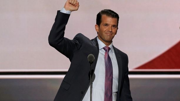 Donald Trump Jr. thrusts his fist after speaking at the 2016 Republican National Convention in Cleveland, Ohio U.S. July 19, 2016.  REUTERS/Mike Segar - RC14B39AFF00